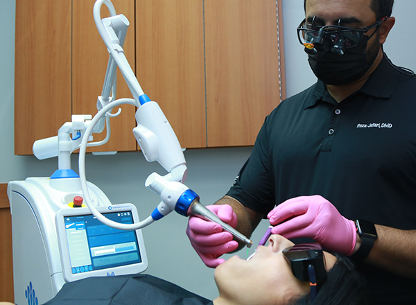 Dentist using Solea laser system
